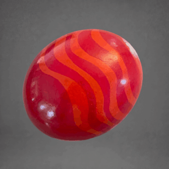 Detailliert bemaltes Straußenei mit rotem Muster