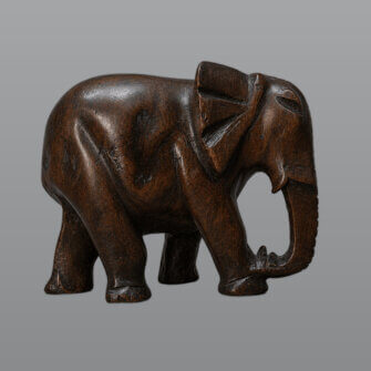 Holzskulptur Elefant – handgeschnitztes Naturholz & Dekoobjekt